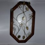 quadro com arabescos de ferro